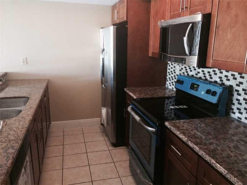 1649 Fairway Road, Unit 1649 Pembroke Pines, FL 33026 - Photo 6 of 8 Kitchen