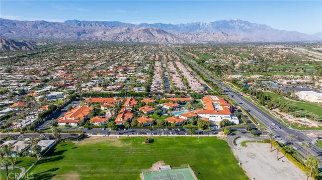 a view of a golf course with a lake