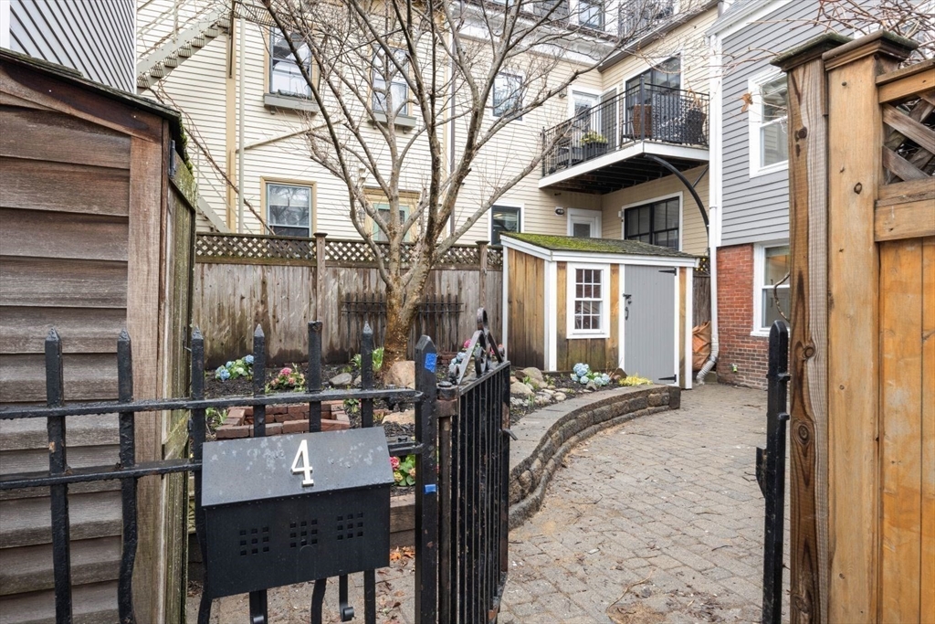 4 Mead St Court Boston, MA 02129 - Photo 23 of 29 a view of a house with backyard porch and sitting area