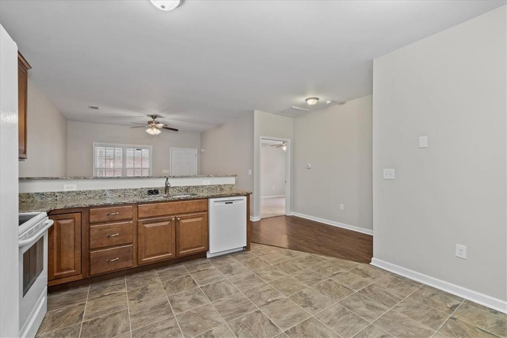 150 Old Mill Road, Unit 435 Cartersville, GA 30120 - Photo 13 of 22 a large bathroom with a granite countertop sink and a mirror