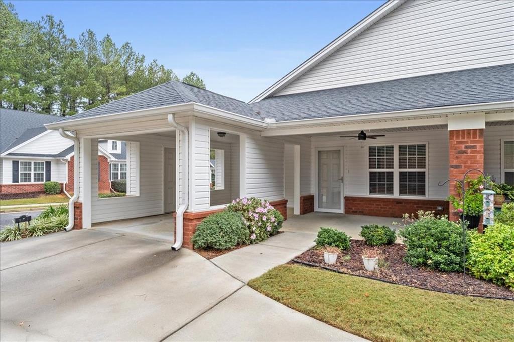 150 Old Mill Road, Unit 435 Cartersville, GA 30120 - Photo 5 of 22 a front view of a house with garden