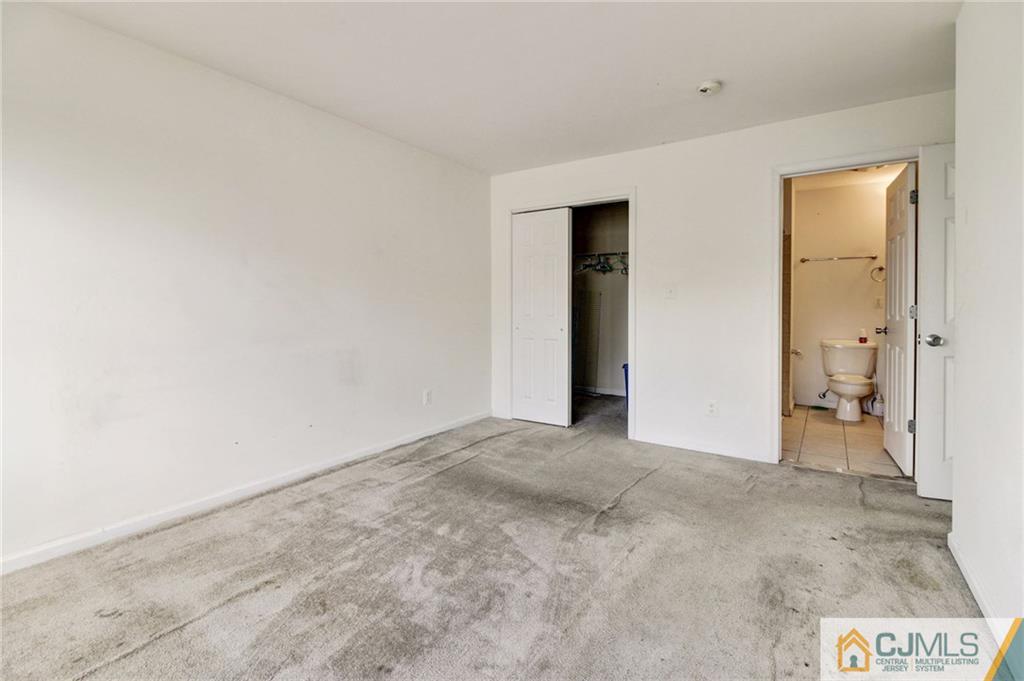 1131 Edpas Road, Unit 1131 New Brunswick, NJ 08901 - Photo 12 of 20 an empty room with a bathroom