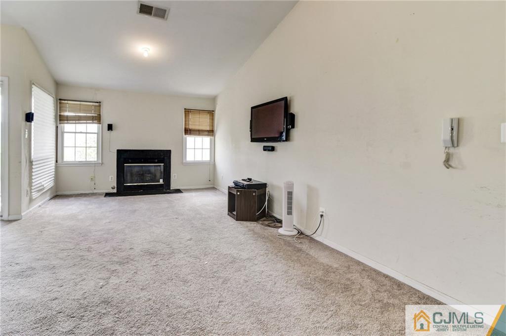 1131 Edpas Road, Unit 1131 New Brunswick, NJ 08901 - Photo 4 of 20 a view of a livingroom with furniture
