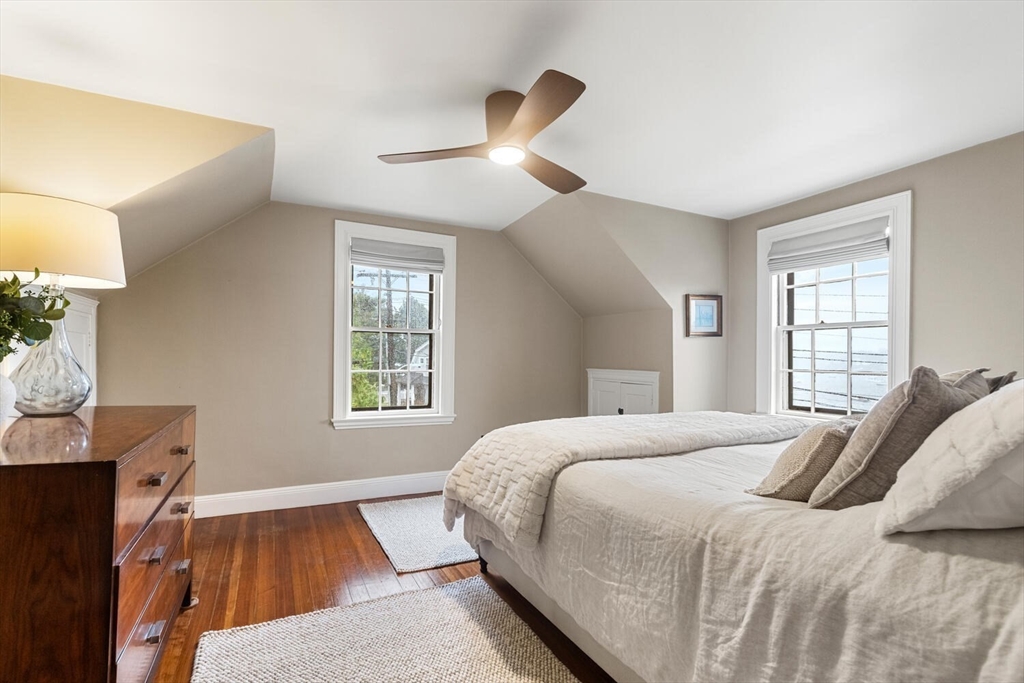 33 Waldron Street Marblehead, MA 01945 - Photo 22 of 42 a bedroom with a bed and a window