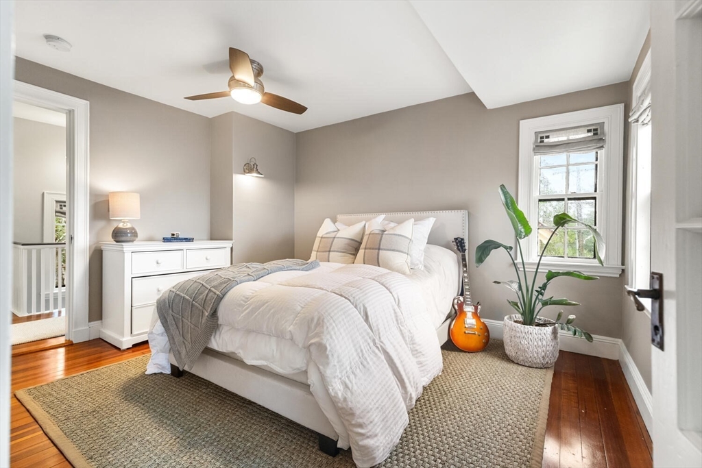 33 Waldron Street Marblehead, MA 01945 - Photo 25 of 42 a bedroom with a bed and ceiling fan
