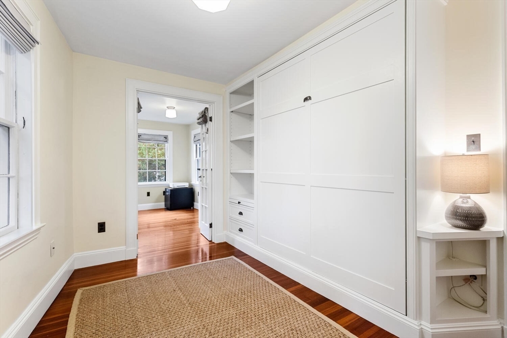33 Waldron Street Marblehead, MA 01945 - Photo 26 of 42 a bedroom with a bed and a window
