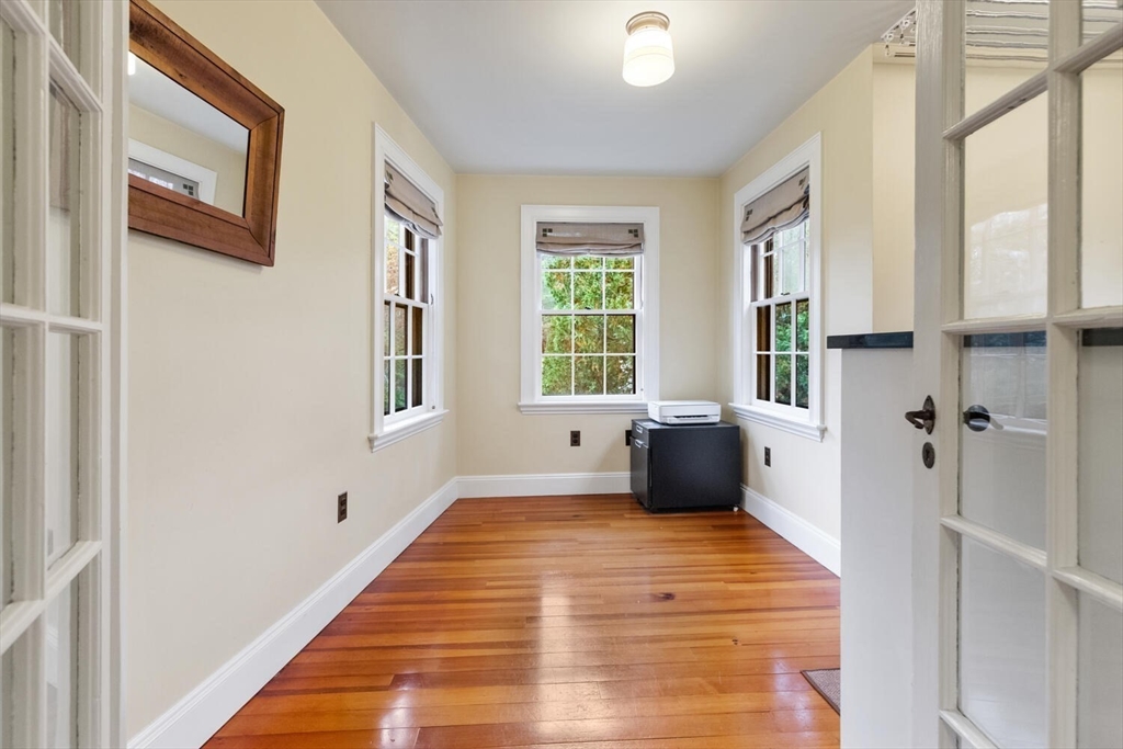 33 Waldron Street Marblehead, MA 01945 - Photo 28 of 42 a view of a bedroom with wooden floor
