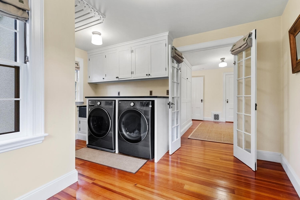 33 Waldron Street Marblehead, MA 01945 - Photo 29 of 42 a view of a hallway with washer and dryer