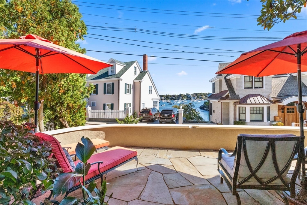 33 Waldron Street Marblehead, MA 01945 - Photo 4 of 42 a view of swimming pool with an outdoor seating