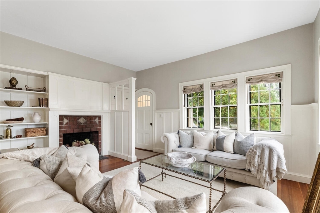 33 Waldron Street Marblehead, MA 01945 - Photo 10 of 42 a living room with furniture and a fireplace