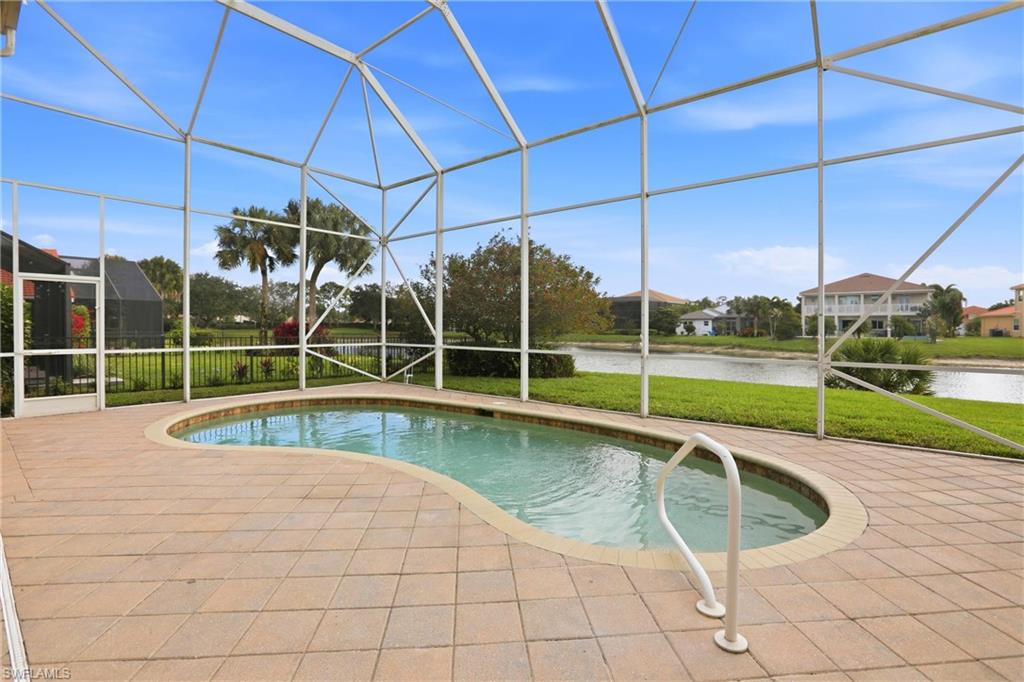 2150 Khasia Point Naples, FL 34119 - Photo 26 of 42 a view of a house with a swimming pool