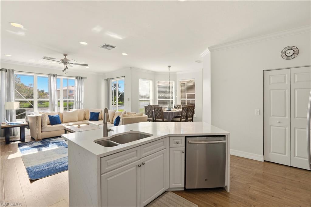 2150 Khasia Point Naples, FL 34119 - Photo 40 of 42 a kitchen with sink and cabinets