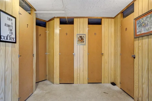 a view of a bathroom with a glass door shower