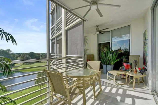 a view of balcony with furniture