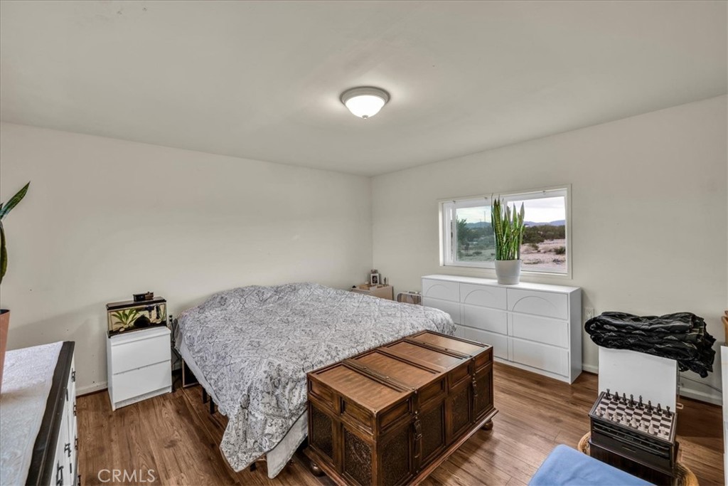 67550 Del Oro Road Twentynine Palms, CA 92277 - Photo 13 of 41 a living room with furniture and a window
