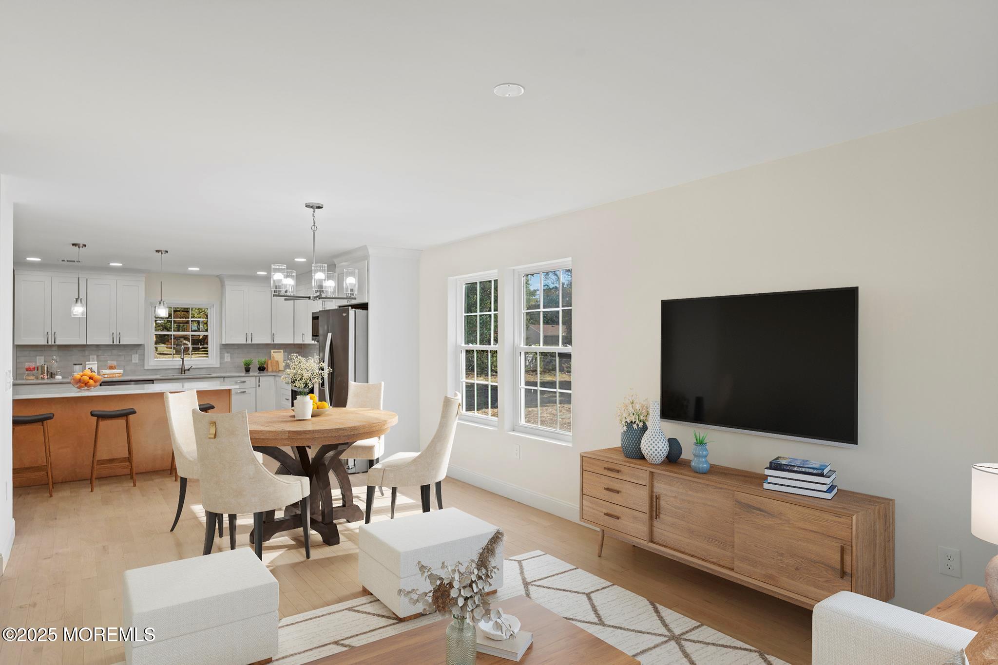 636 Wayside Road Neptune Township, NJ 07753 - Photo 3 of 26 a living room with furniture and a flat screen tv