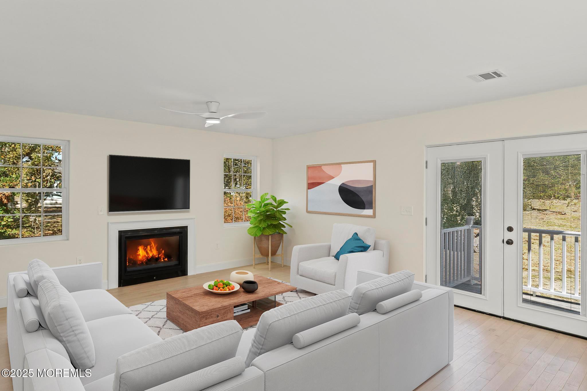 636 Wayside Road Neptune Township, NJ 07753 - Photo 7 of 26 a living room with furniture and a fireplace