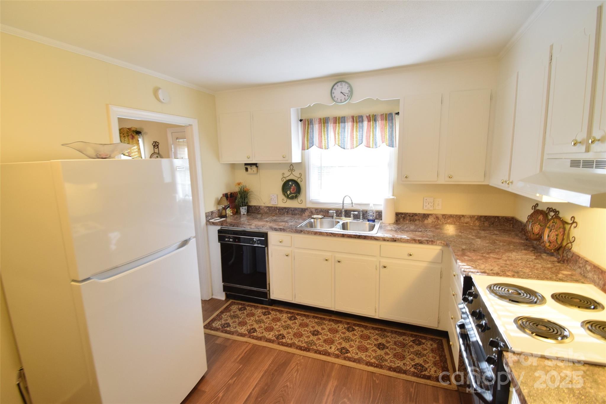 623 South New Hope Road, Unit 13 Gastonia, NC 28054 - Photo 14 of 30 a kitchen with a refrigerator sink and stove