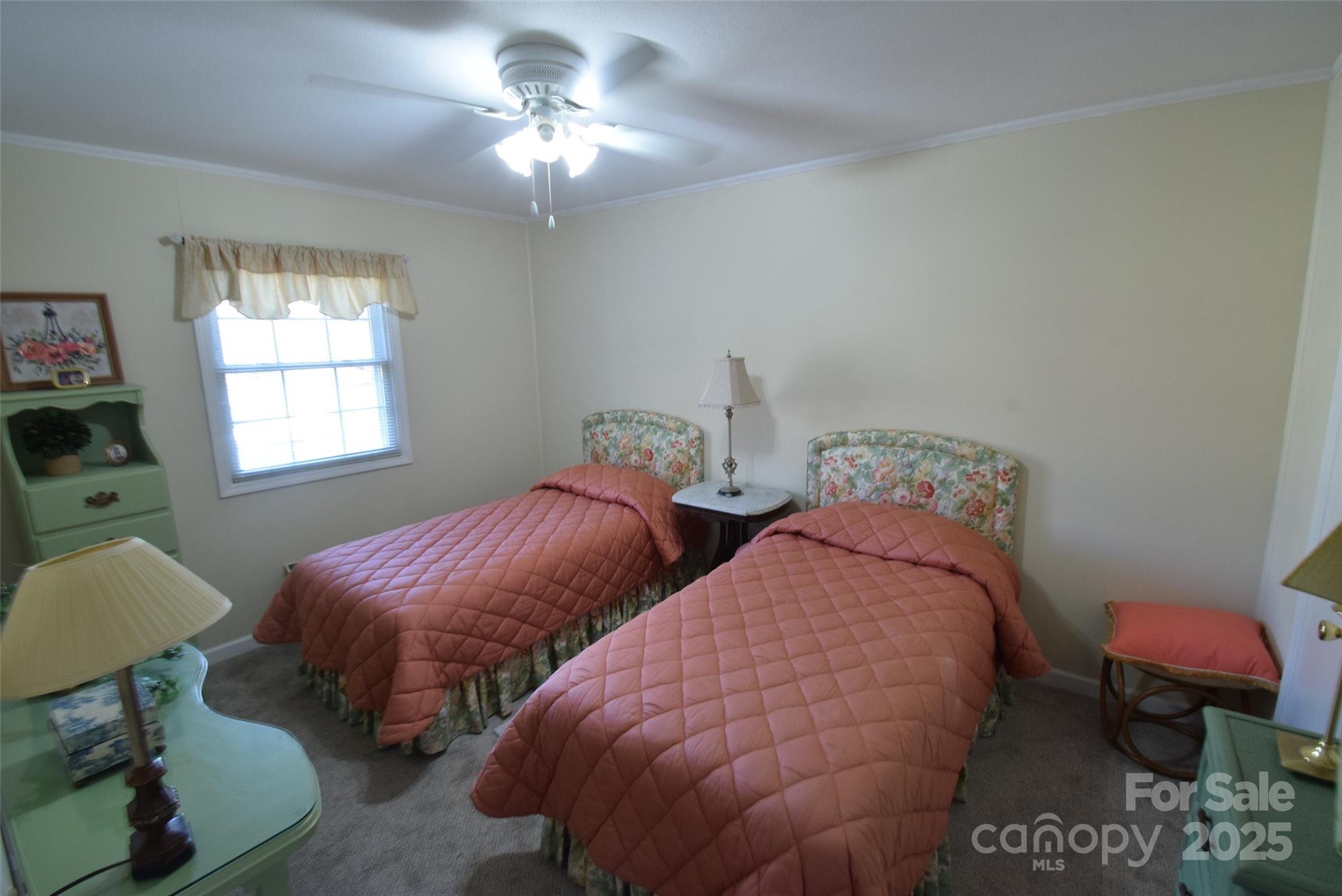 623 South New Hope Road, Unit 13 Gastonia, NC 28054 - Photo 18 of 30 a bedroom with two beds and a chandelier