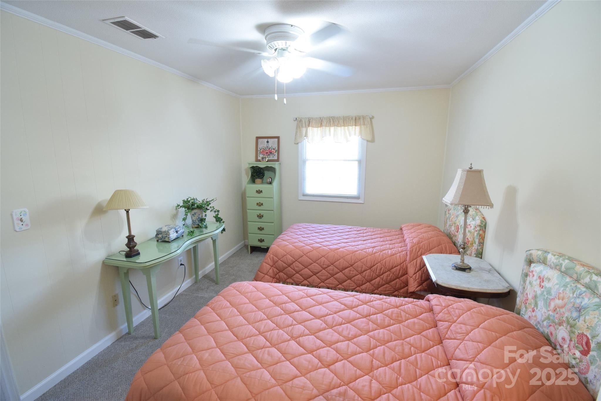 623 South New Hope Road, Unit 13 Gastonia, NC 28054 - Photo 19 of 30 a bedroom with a bed and window