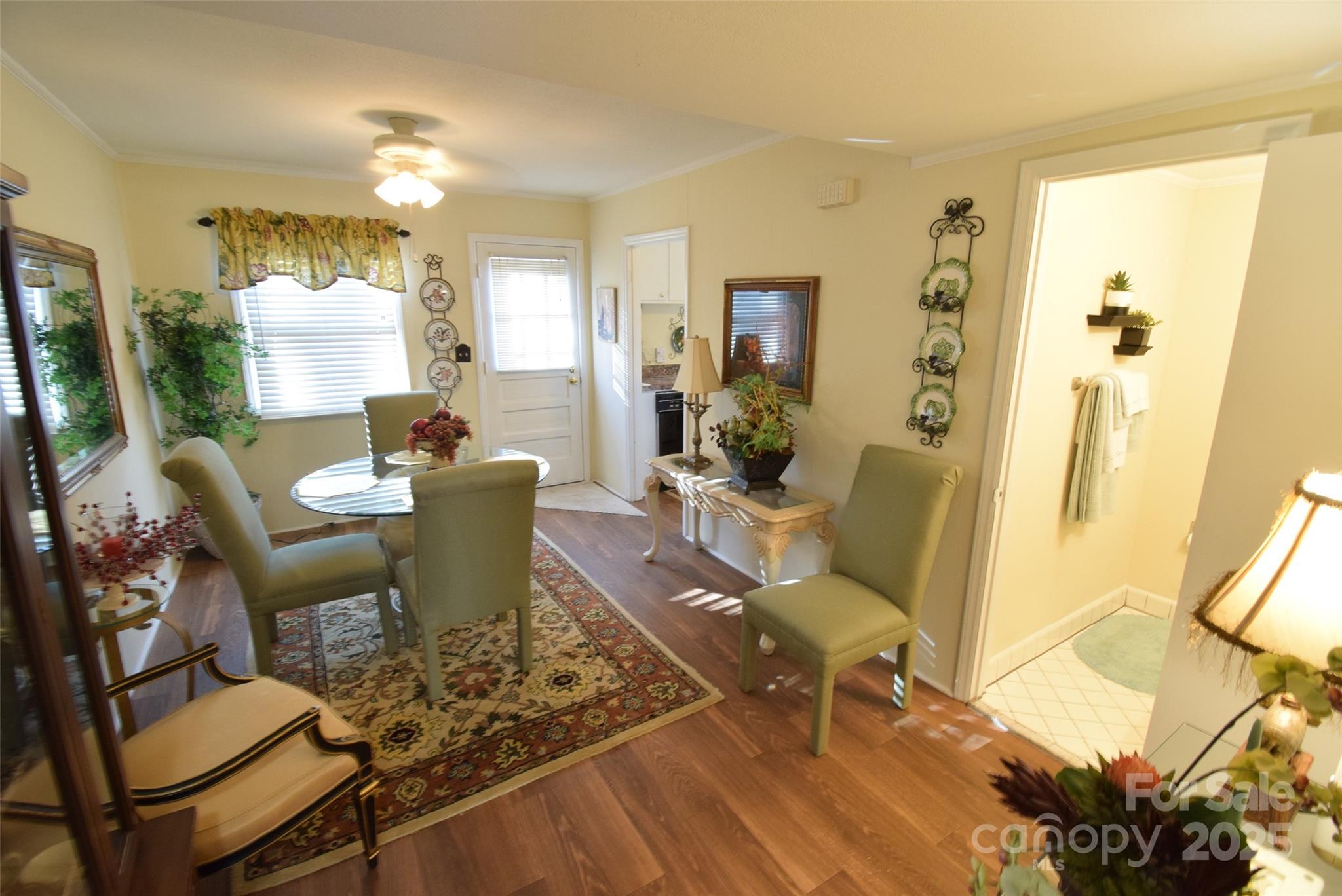 623 South New Hope Road, Unit 13 Gastonia, NC 28054 - Photo 7 of 30 a living room with furniture and a wooden floor