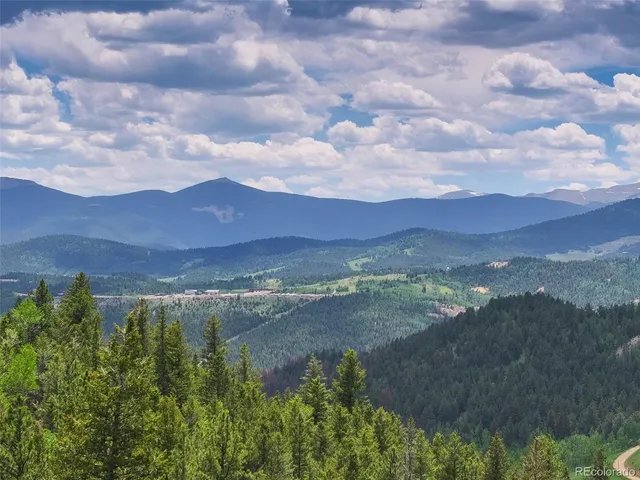 a view of an outdoor and trees