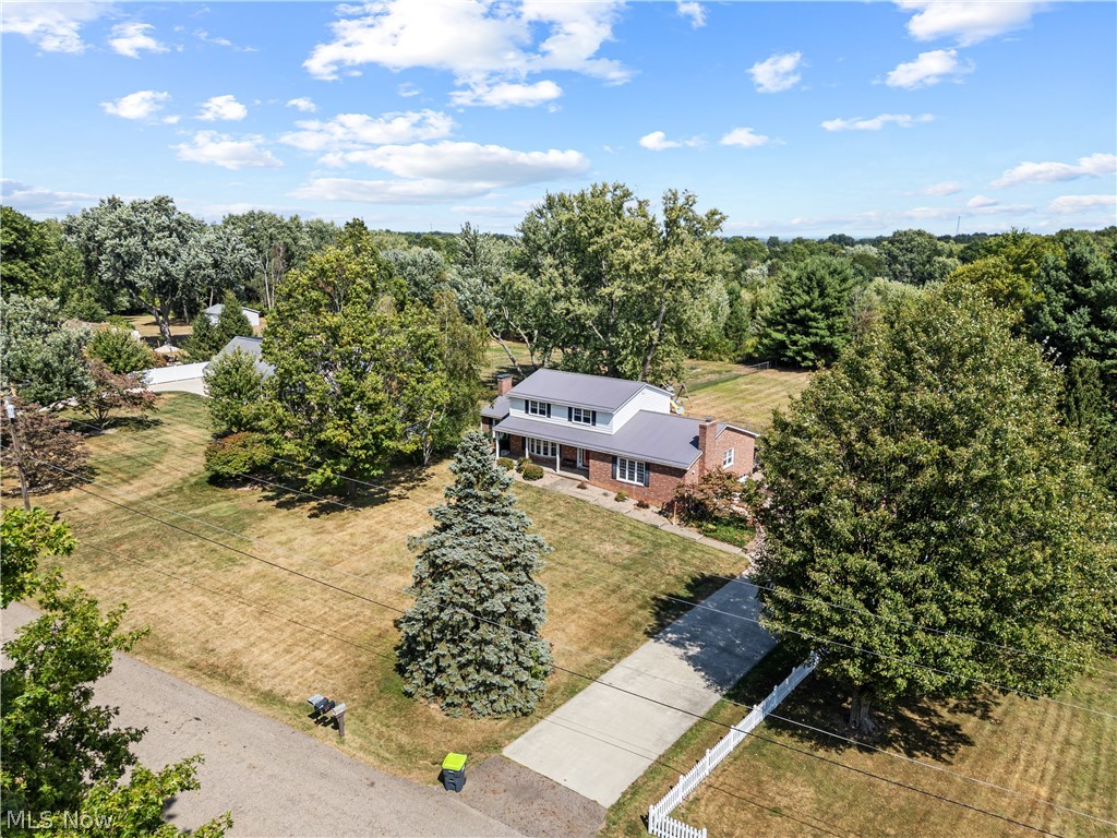3650 Rambo Avenue Alliance, OH 44601 - Photo 5 of 36 Brick exterior with a gray roof and white trim