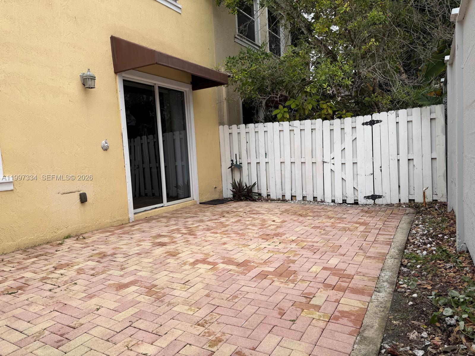 14934 Southwest 41st Lane, Unit 14934 Miami, FL 33185 - Photo 35 of 36 a view of a backyard of the house