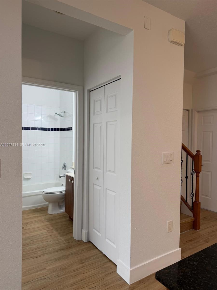 14934 Southwest 41st Lane, Unit 14934 Miami, FL 33185 - Photo 8 of 36 a bathroom with a toilet