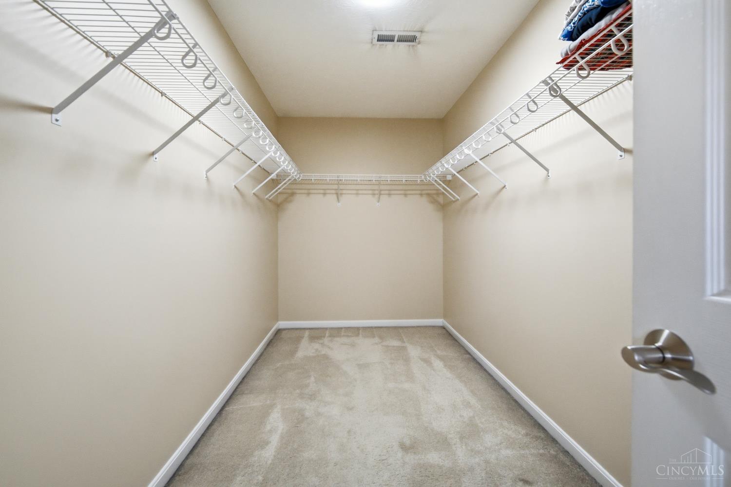 4431 Springfield Lane Mason, OH 45040 - Photo 32 of 52 Spacious primary suite with a huge walk-in closet offering exceptional storage.
