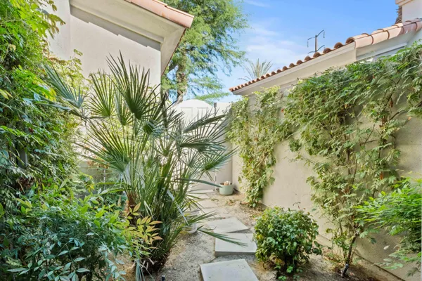 a backyard of a house with lots of green space