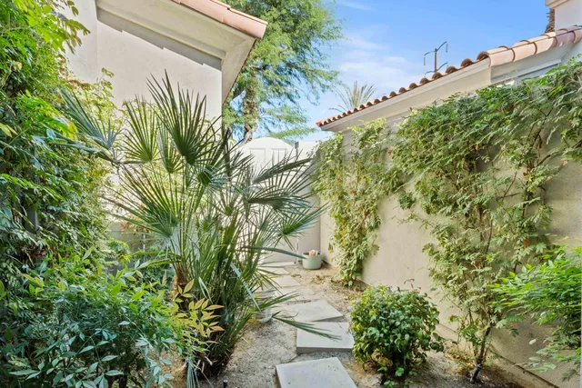a backyard of a house with lots of green space