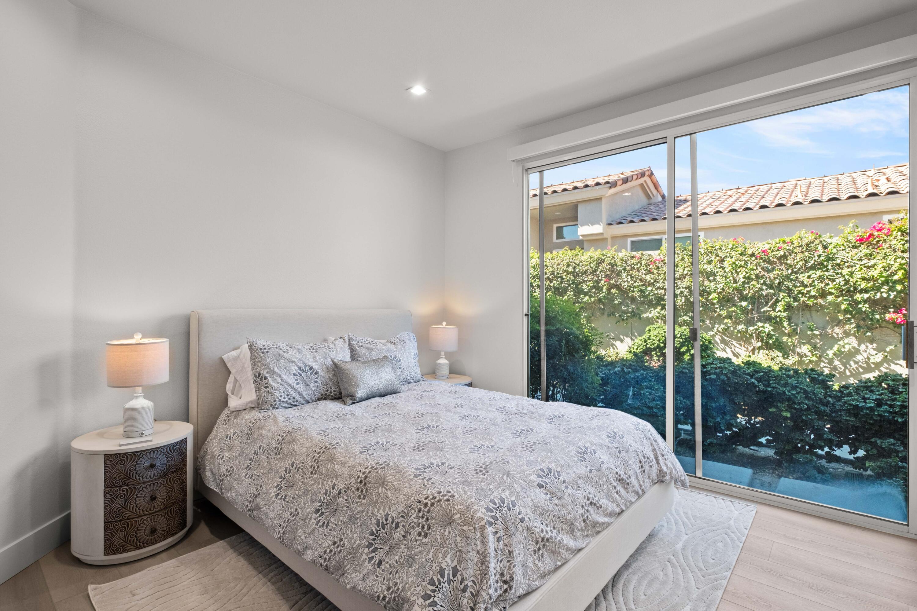 781 Box Canyon Trail Palm Desert, CA 92211 - Photo 20 of 31 a bed sitting in a bedroom next to a window