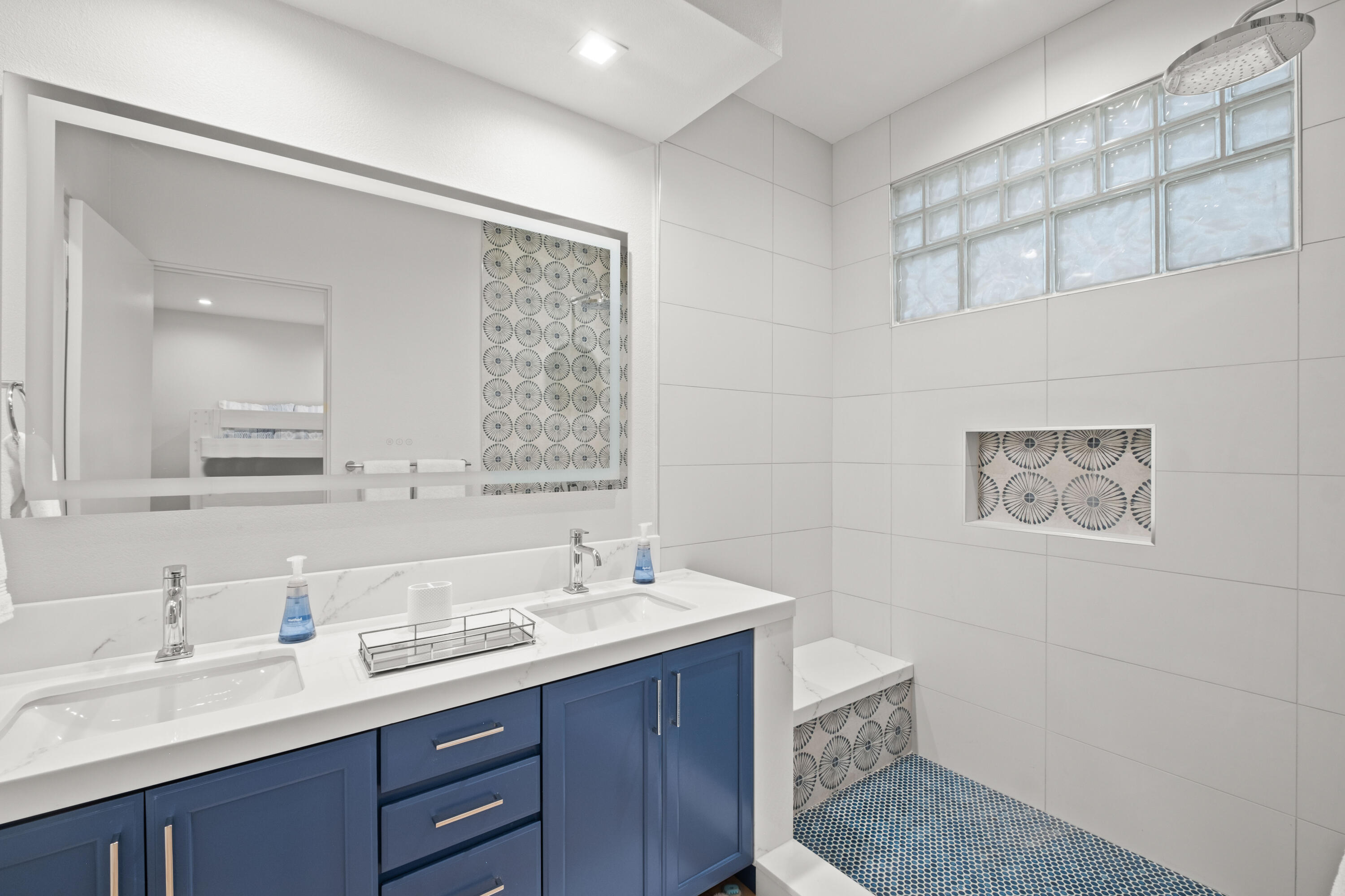 781 Box Canyon Trail Palm Desert, CA 92211 - Photo 23 of 31 a bathroom with a double vanity sink and a mirror