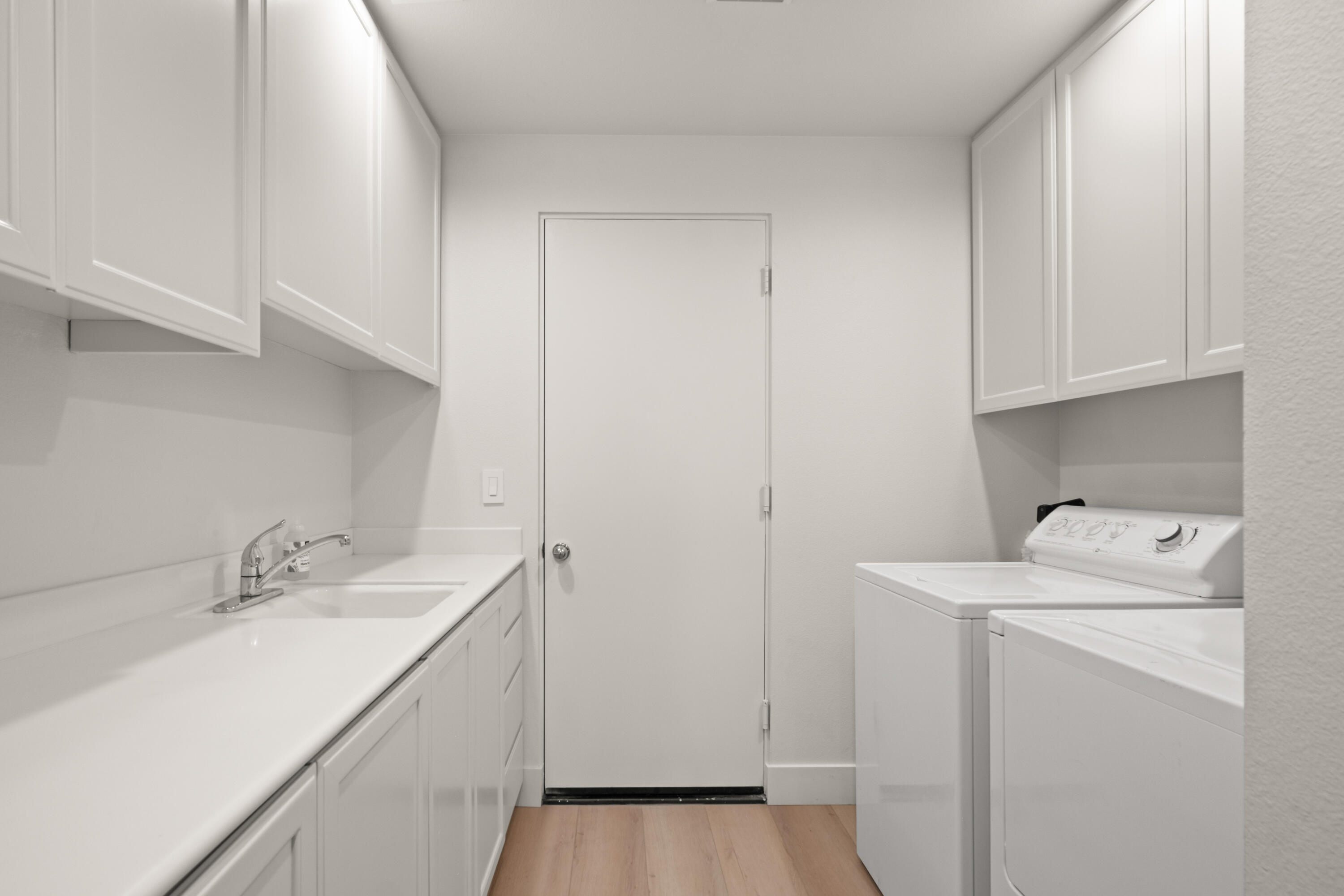 781 Box Canyon Trail Palm Desert, CA 92211 - Photo 25 of 31 a utility room with a sink washer and dryer