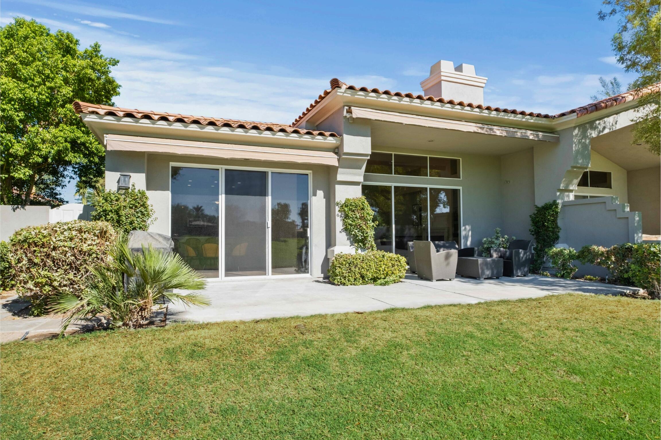 781 Box Canyon Trail Palm Desert, CA 92211 - Photo 28 of 31 front view of a house with a yard