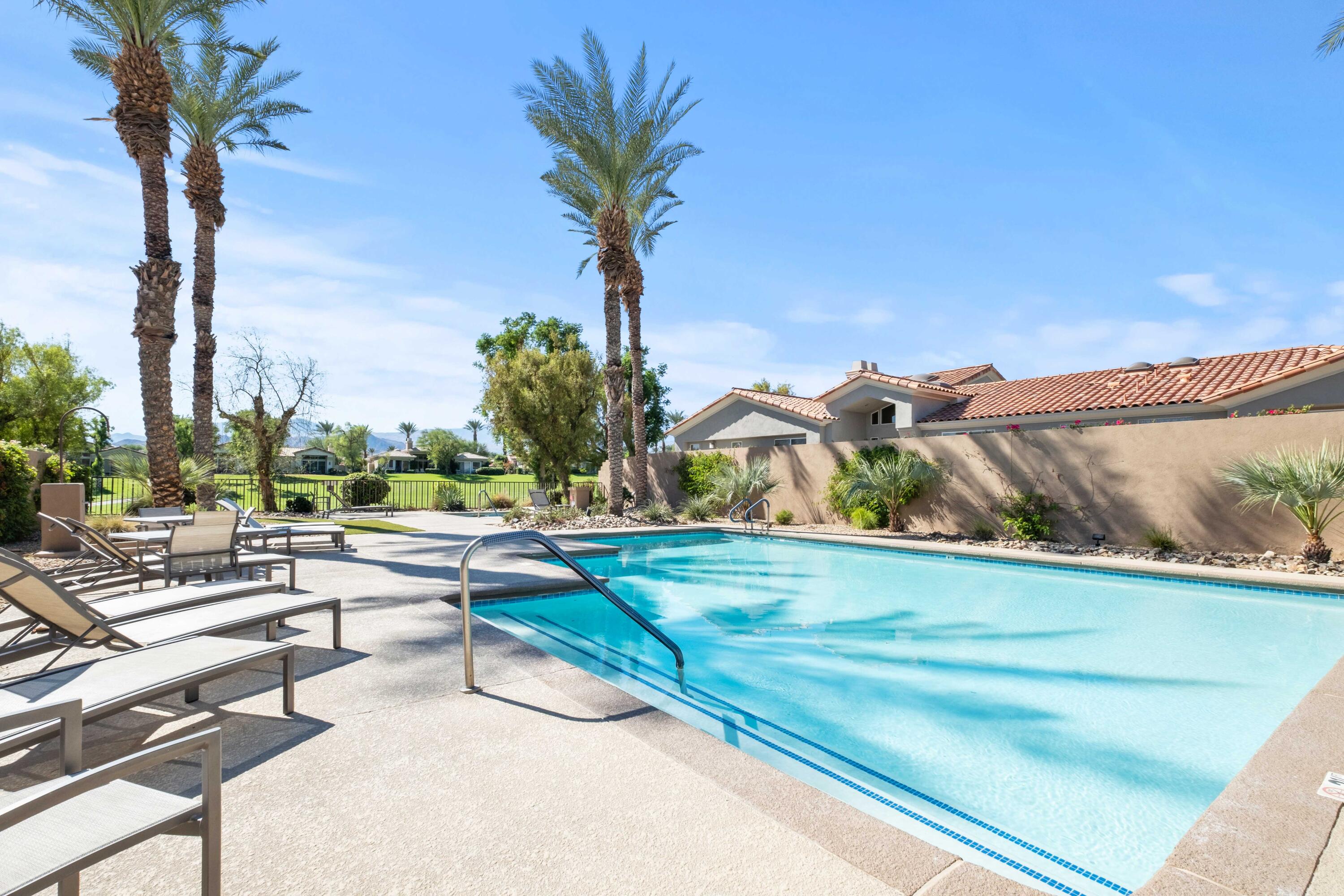 781 Box Canyon Trail Palm Desert, CA 92211 - Photo 31 of 31 a view of swimming pool with outdoor seating and city view