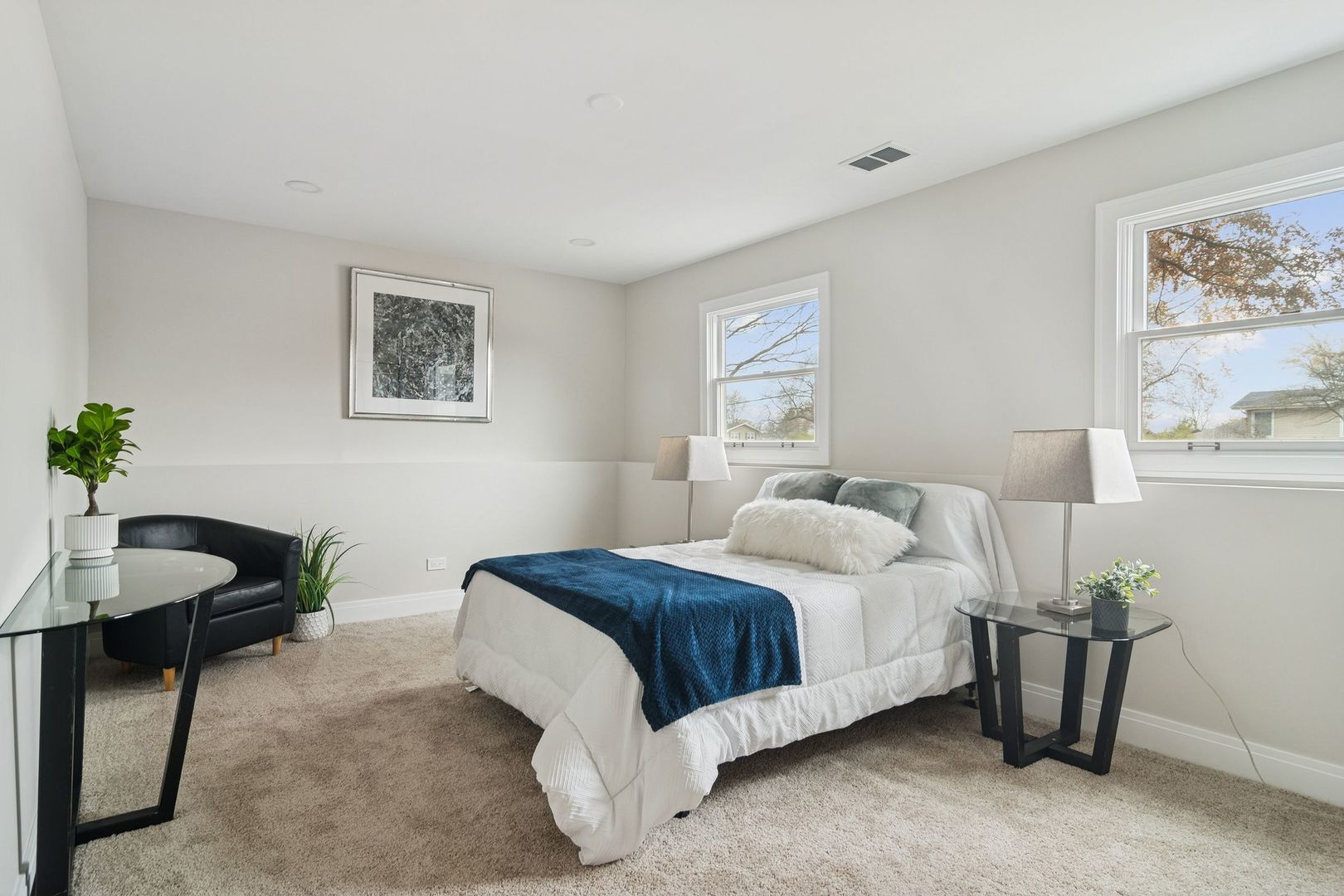 1420 Hassell Road Hoffman Estates, IL 60169 - Photo 21 of 26 a bedroom with a bed and a painting on the wall