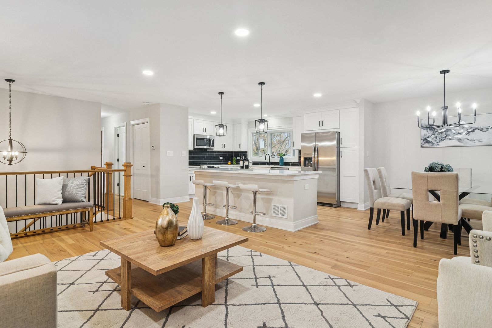 1420 Hassell Road Hoffman Estates, IL 60169 - Photo 6 of 26 a living room with lots of furniture and kitchen view