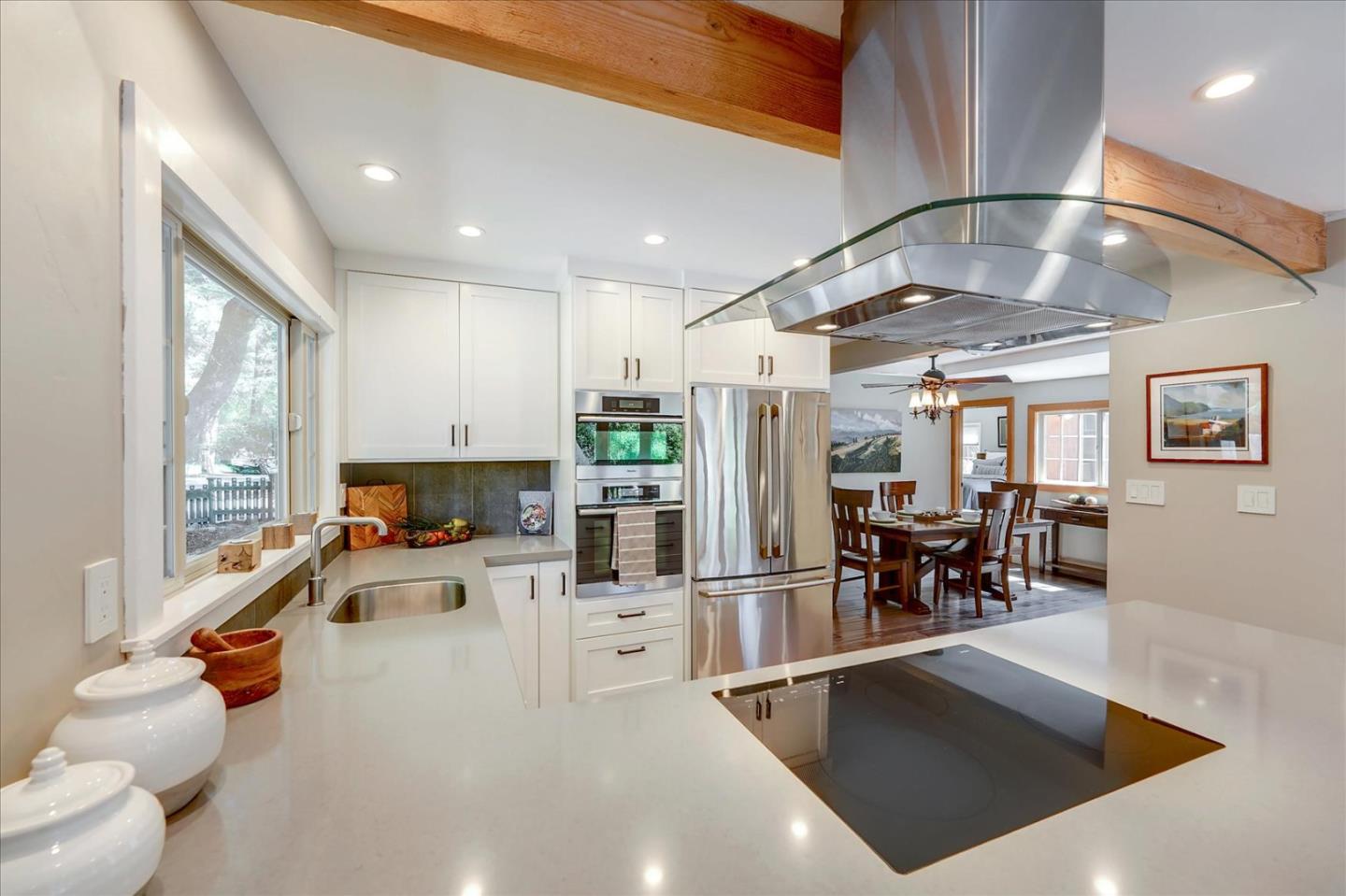 77 Forest Road Mount Hermon, CA 95041 - Photo 17 of 46 a kitchen with stainless steel appliances lots of counter top space and furniture