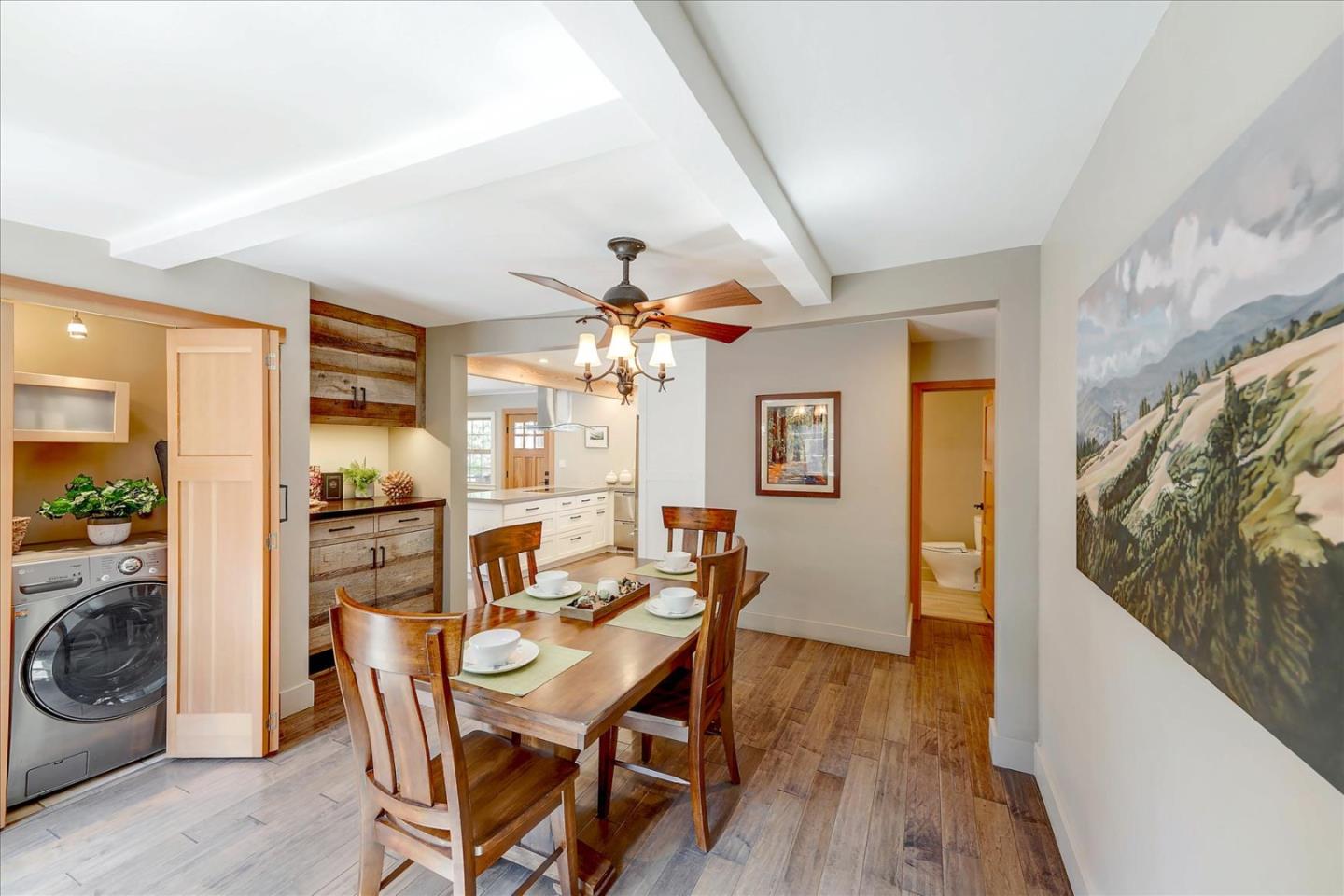 77 Forest Road Mount Hermon, CA 95041 - Photo 22 of 46 a view of a dining room with furniture a chandelier and wooden floor