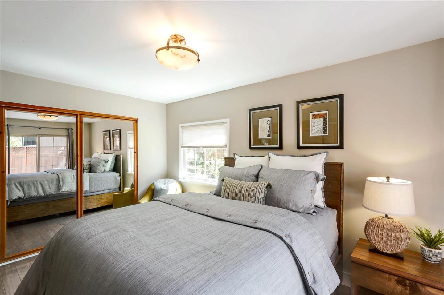 77 Forest Road Mount Hermon, CA 95041 - Photo 25 of 46 a bedroom with a bed and window