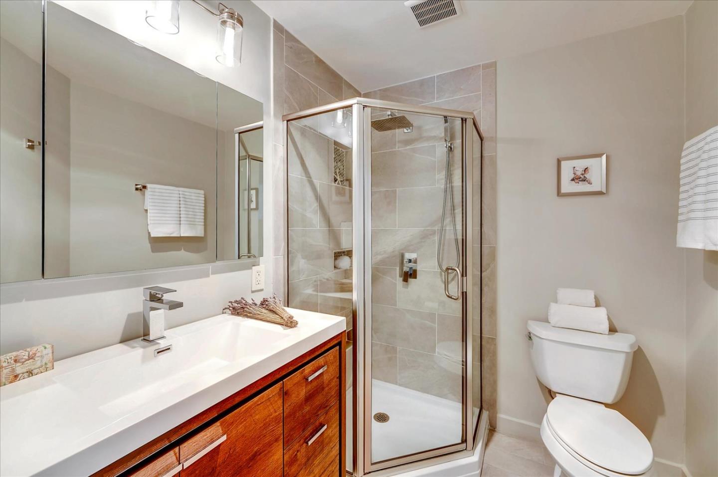 77 Forest Road Mount Hermon, CA 95041 - Photo 27 of 46 a bathroom with a sink toilet and shower