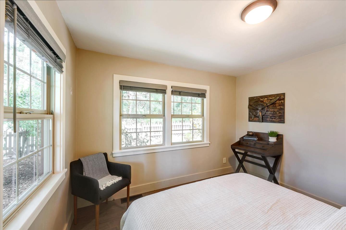 77 Forest Road Mount Hermon, CA 95041 - Photo 30 of 46 a bedroom with a bed and window