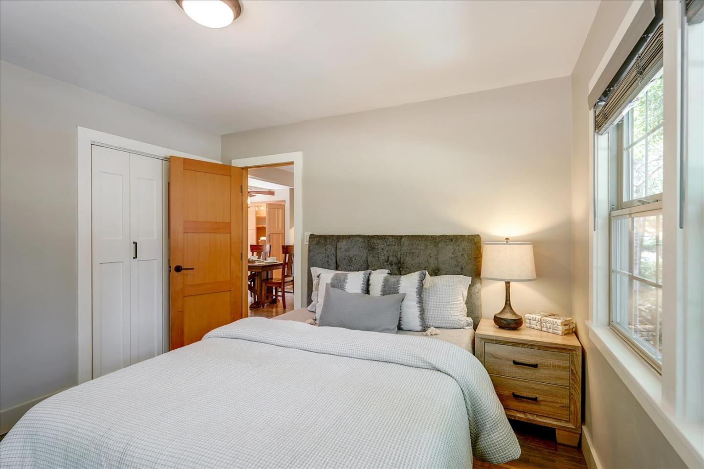 77 Forest Road Mount Hermon, CA 95041 - Photo 31 of 46 a bedroom with a bed and a window