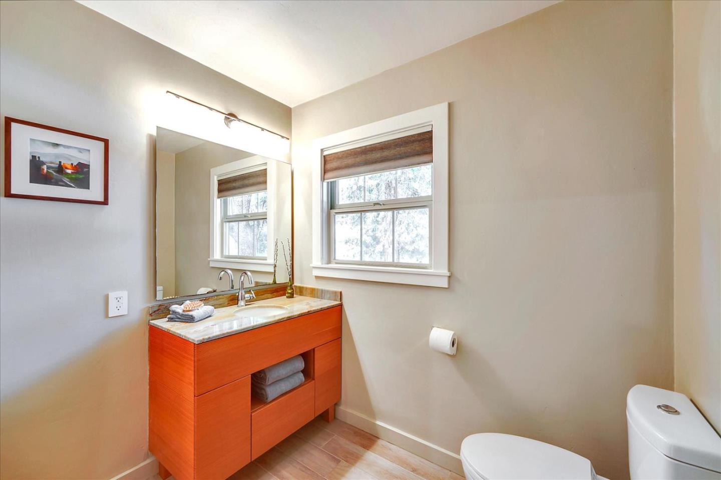 77 Forest Road Mount Hermon, CA 95041 - Photo 34 of 46 a bathroom with a sink mirror vanity and toilet