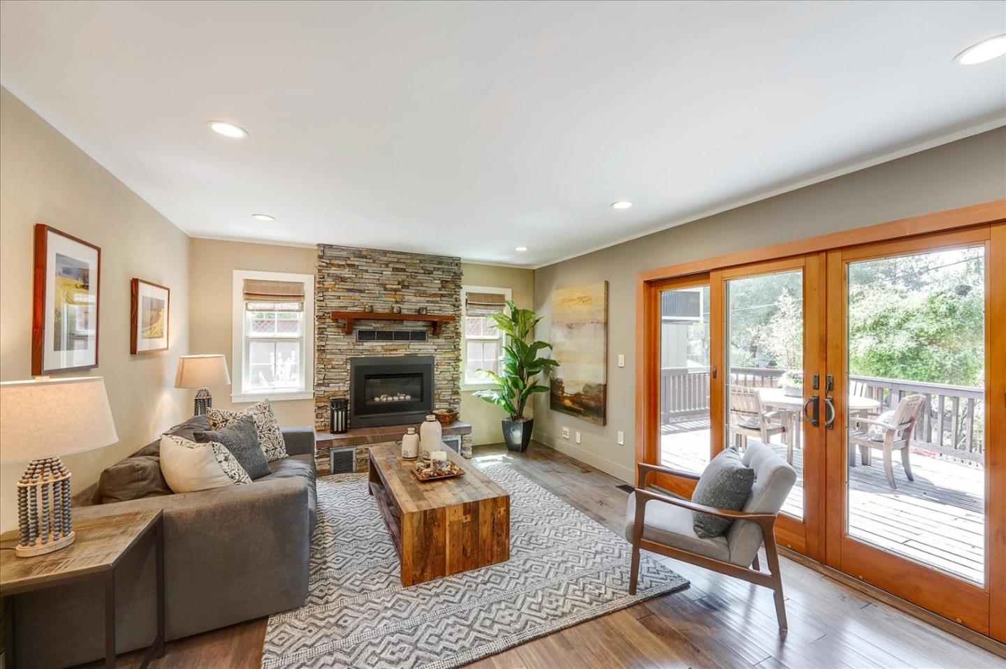 77 Forest Road Mount Hermon, CA 95041 - Photo 6 of 46 a living room with furniture and a fireplace