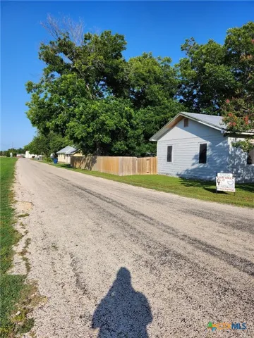 a bathroom with a sink and a yard