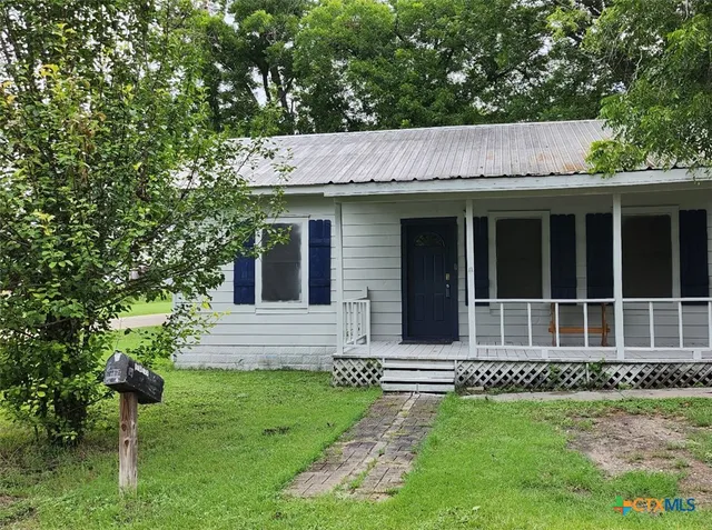 a house with a garden view