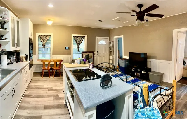 a very nice looking dining room with a table and chairs